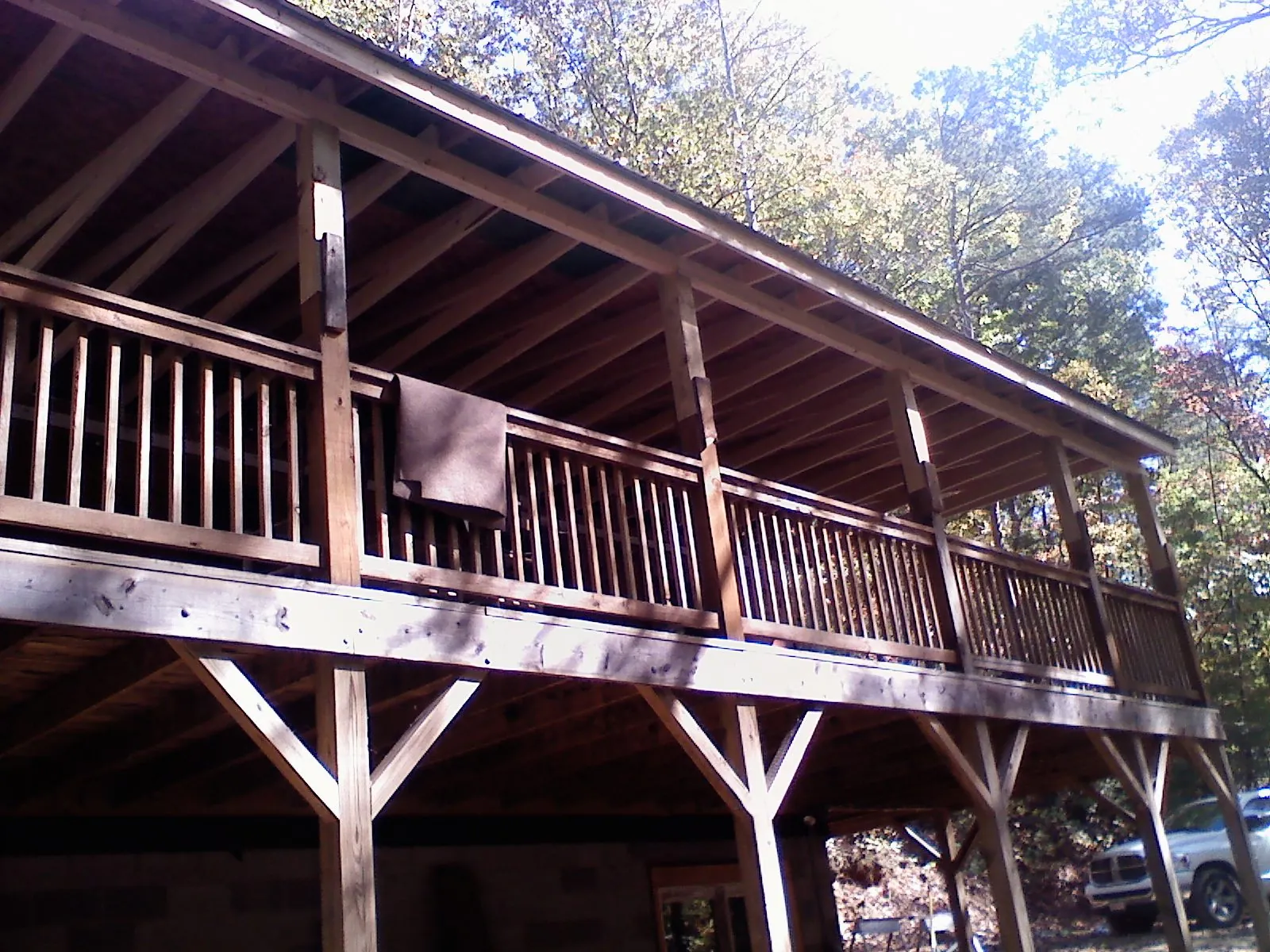 Timber framing under a new elevated porch and deck — Roof Leak Repair in Ouray by Roofing Brothers